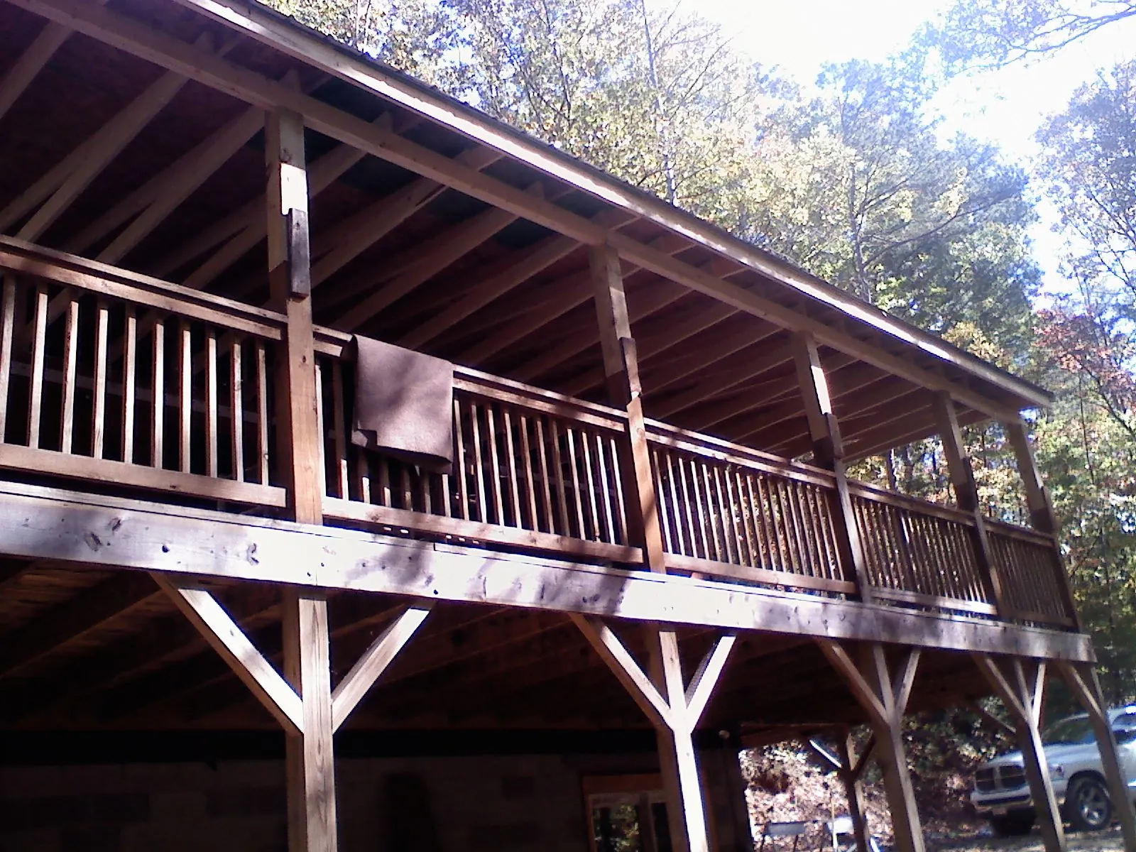 Timber framing under a new elevated porch and deck — Roof Leak Repair in Excelsior Springs by Roofing Brothers